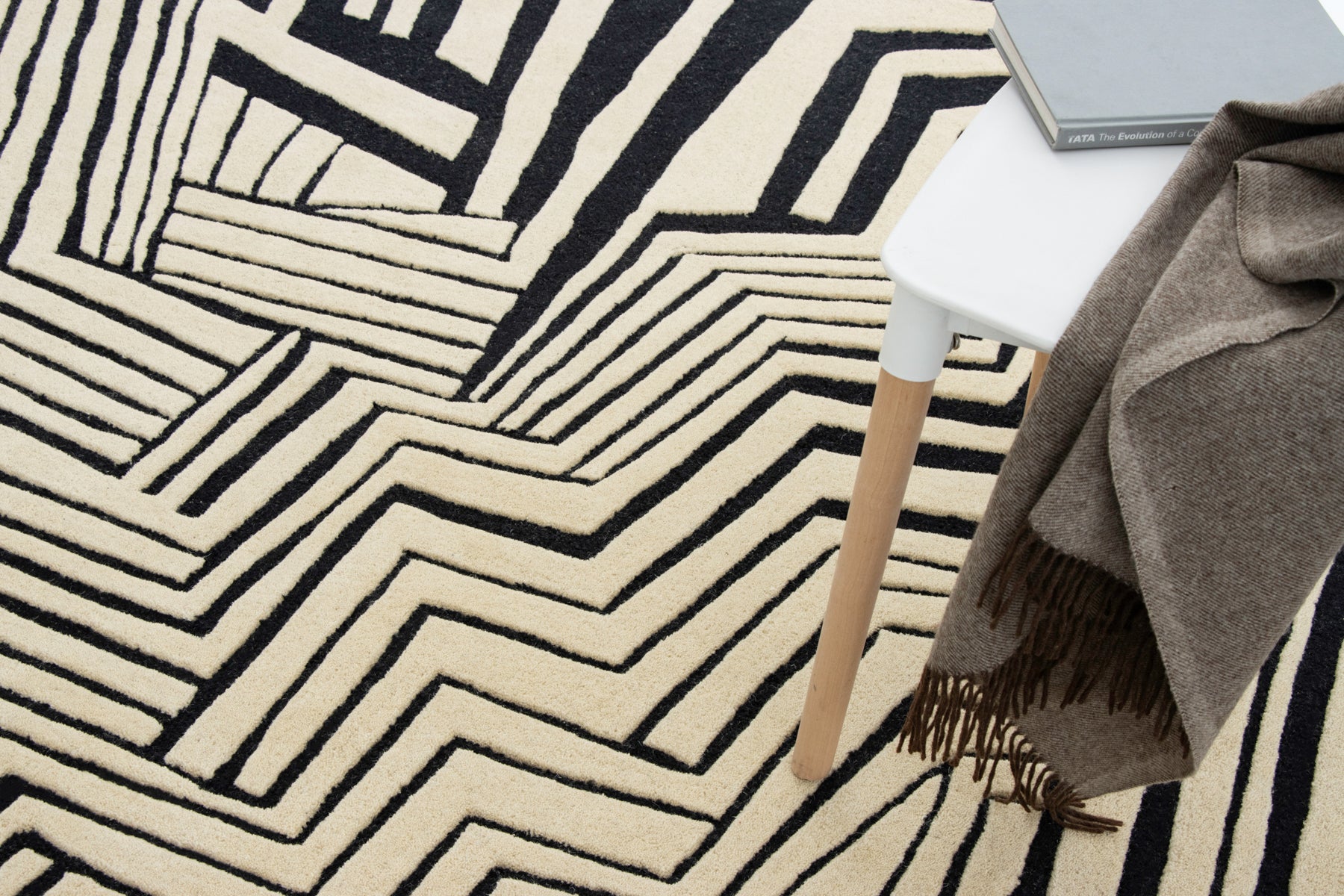 Close-up black beige zigzag irregular rug texture | Beyond Rugs USA