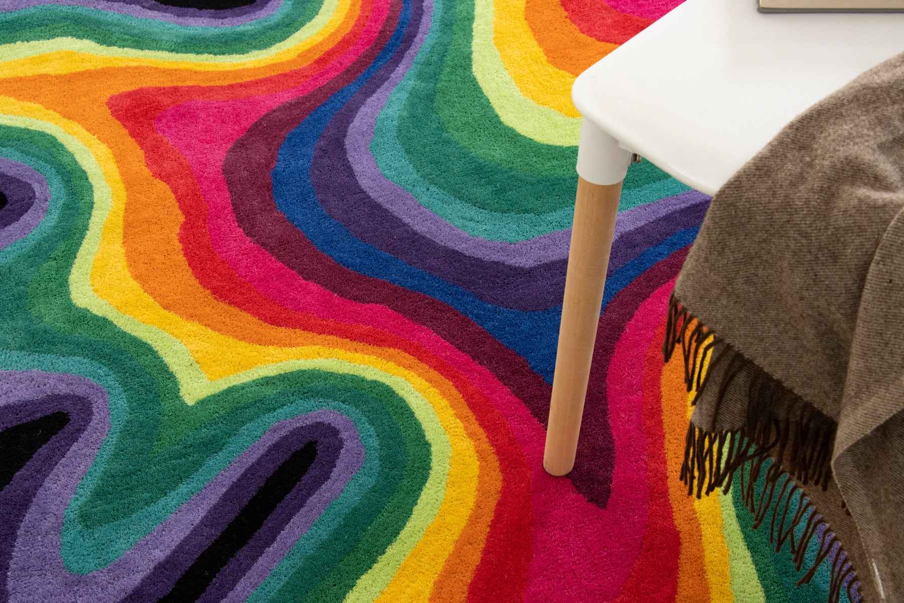 Paint Melts Rhapsody irregular shaped rug edge detail - multicolor flowing border with rainbow pattern