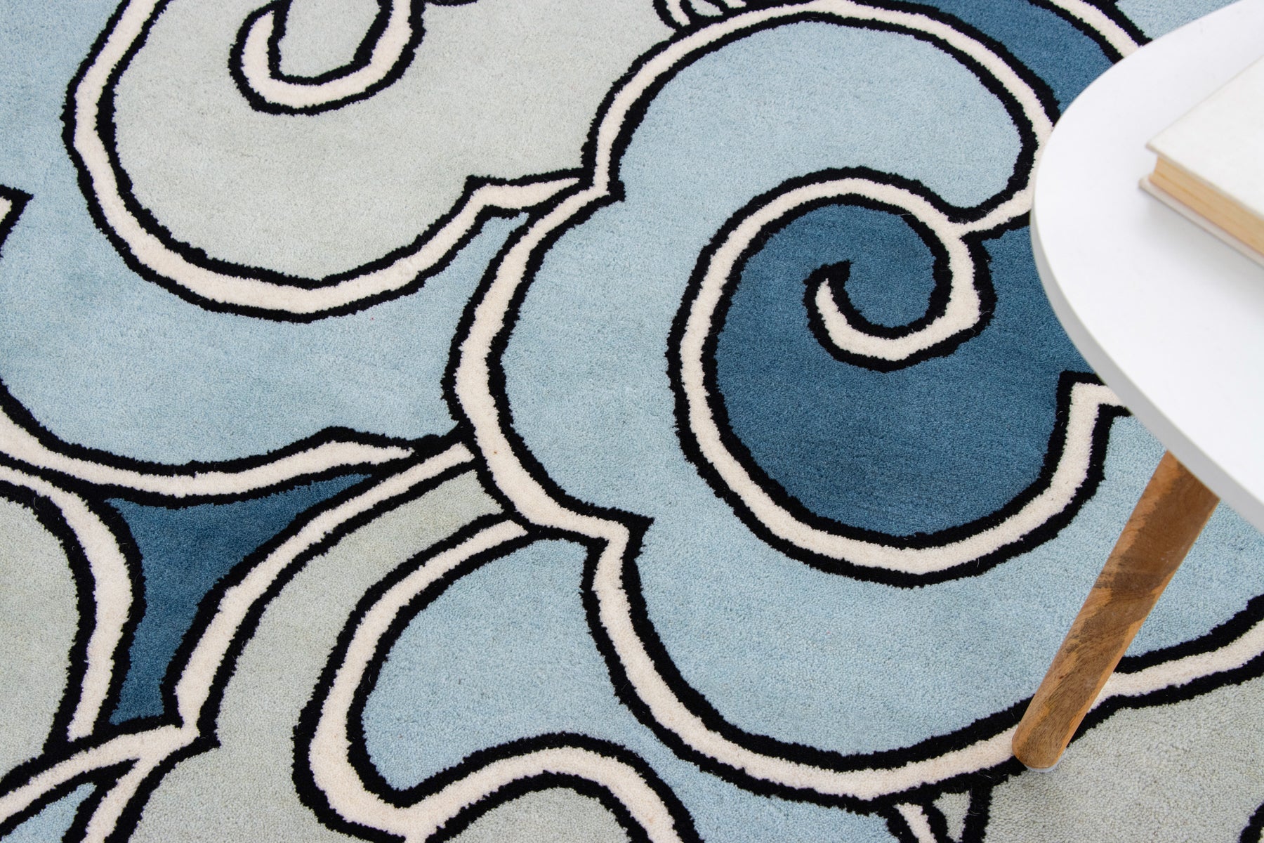 Luxury hand tufted cloud design carpet in calming sky blue colors | Beyond Rags