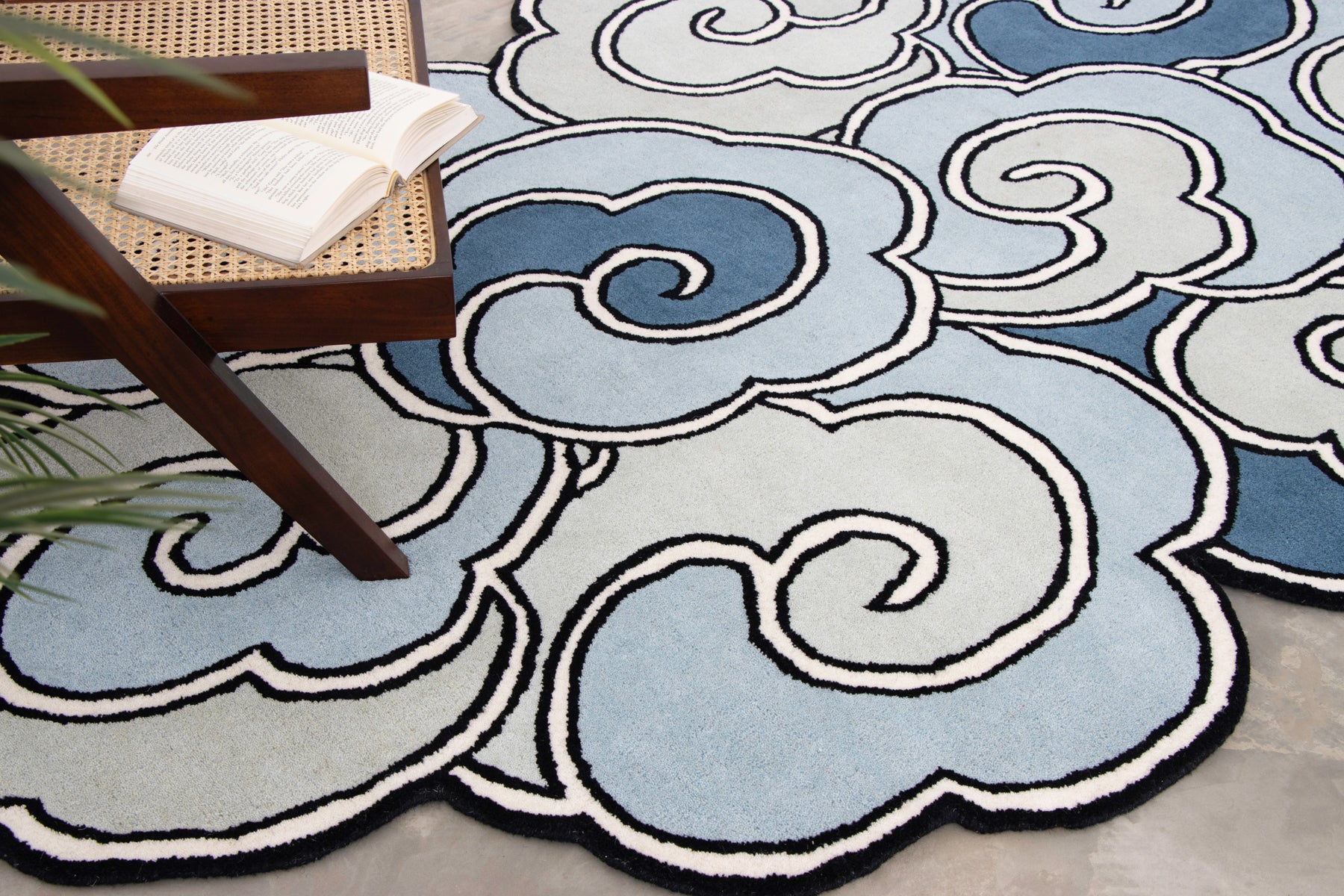 Contemporary blue abstract rug with dreamy cloud motif | Beyond Rags