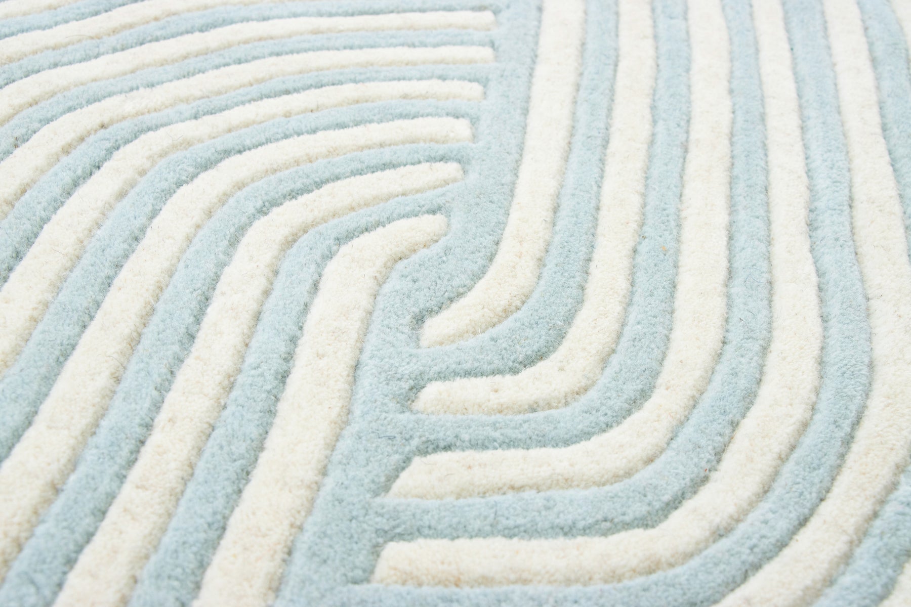 Overhead corner blue hand tufted irregular rug | Beyond Rugs USA