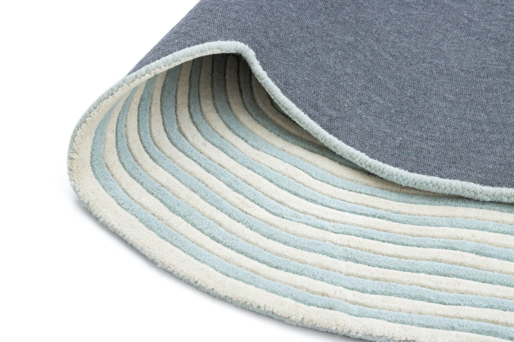 Close-up blue cream hand tufted braid texture | Beyond Rugs USA