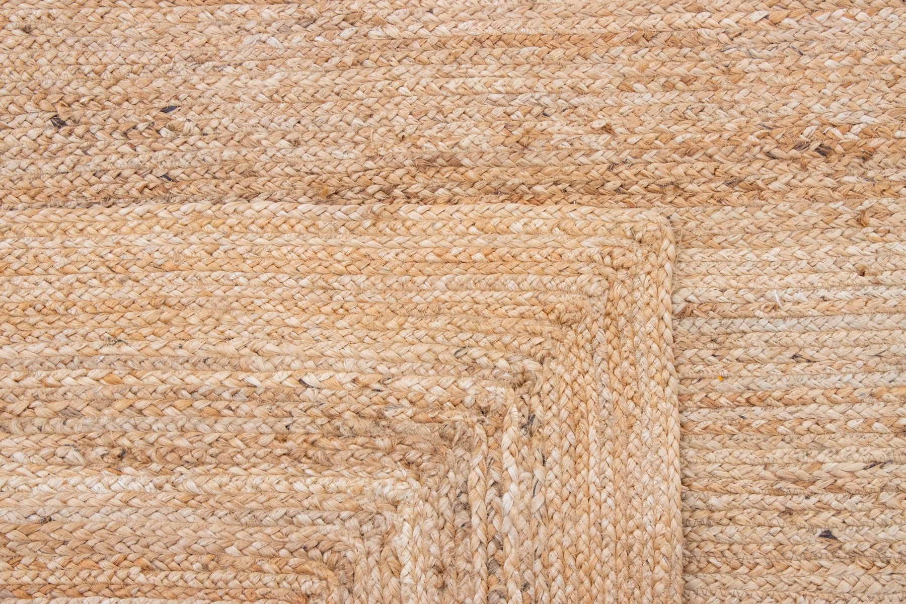Close-up of a woven jute rug.
