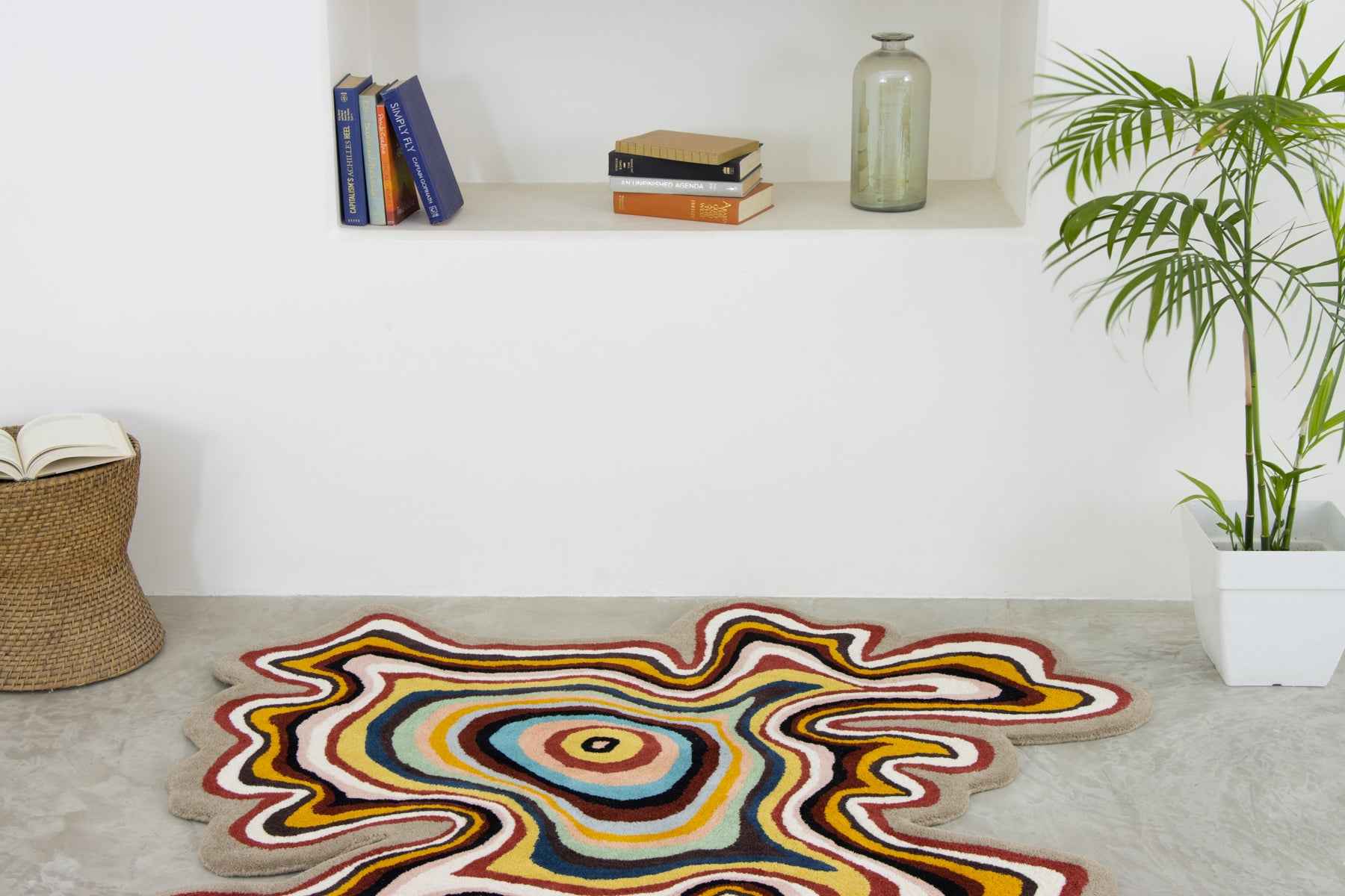 Paint Melts abstract rug placed in creative studio space with contemporary decor