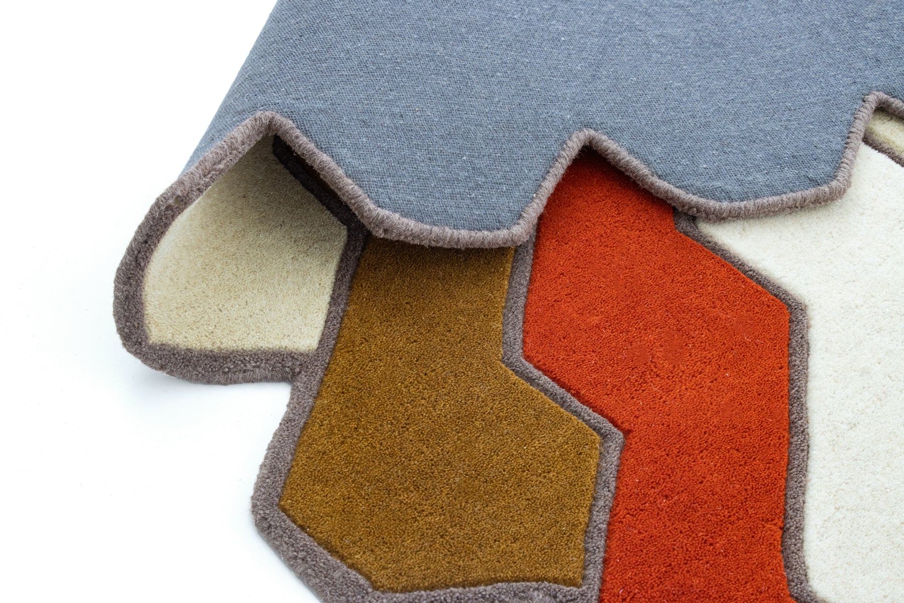 Open book on colorful irregular rope area rug | Beyond Rugs USA