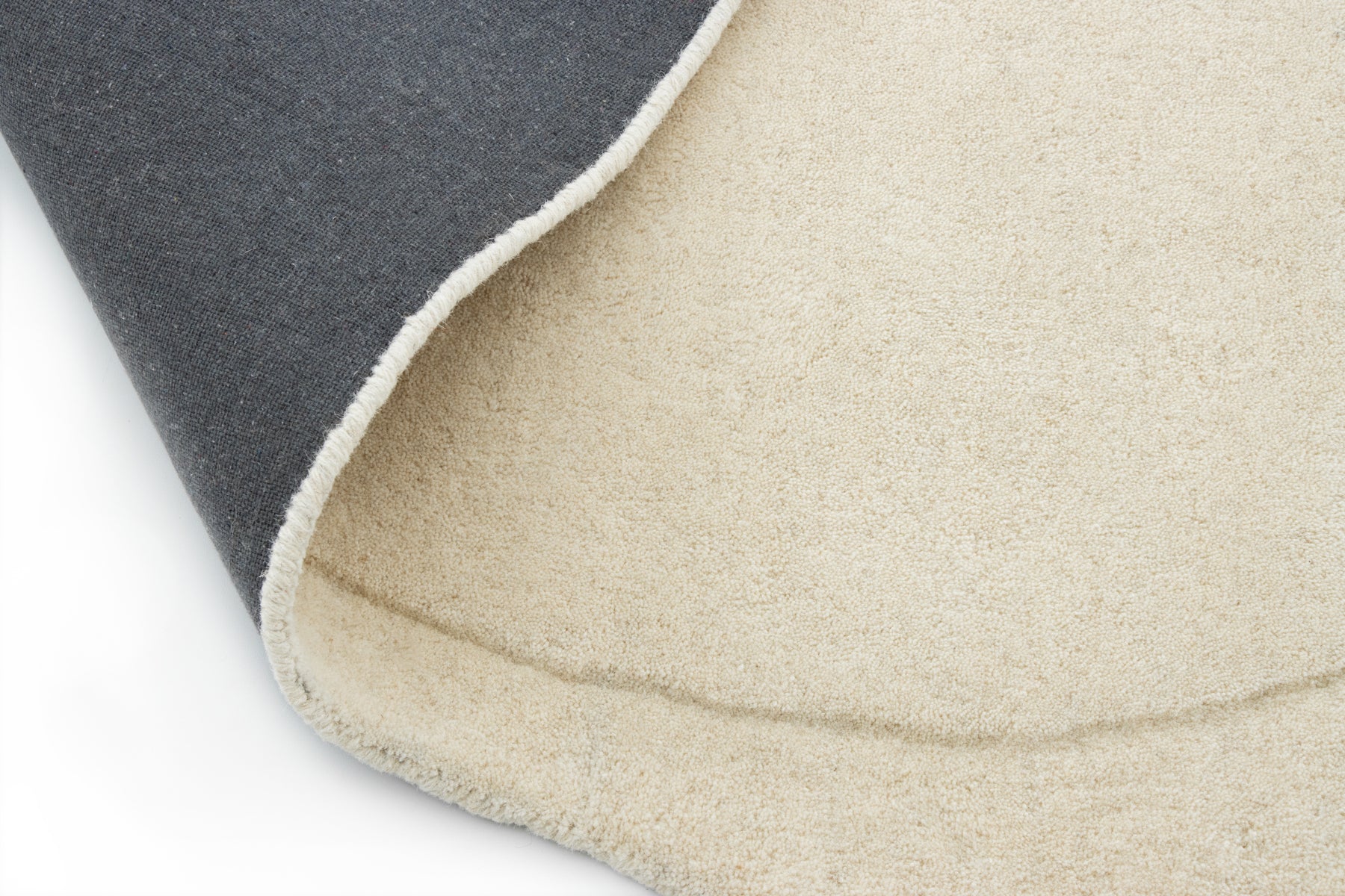 Organic bean shape rug in cream wool, luxury hand tufted floor covering | Beyond Rugs