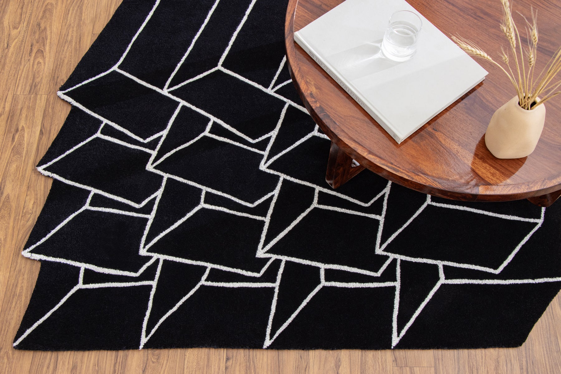 Overhead view black irregular geometric area rug | Beyond Rugs USA